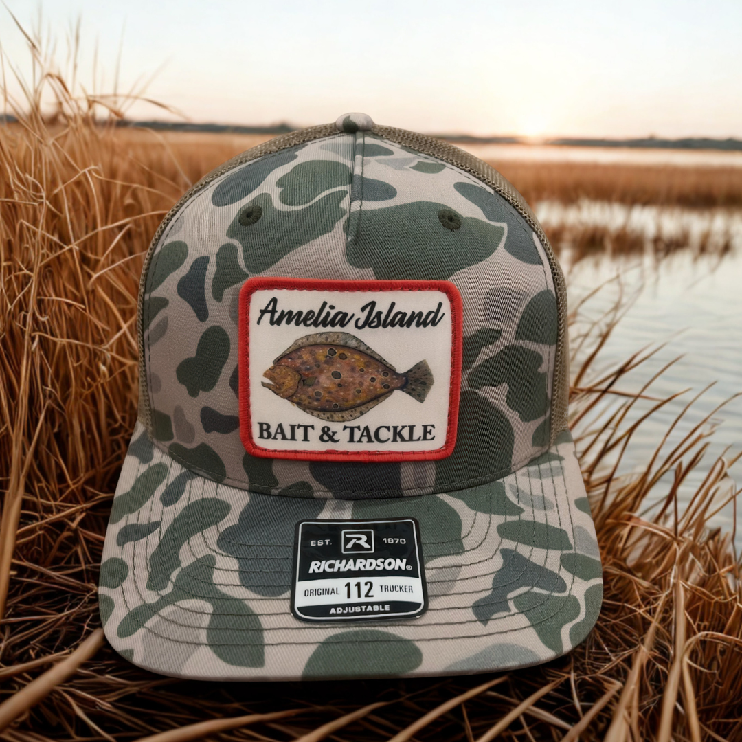 AIBT flounder patch trucker hat Richardson 112 in duck camo marsh - hero view
