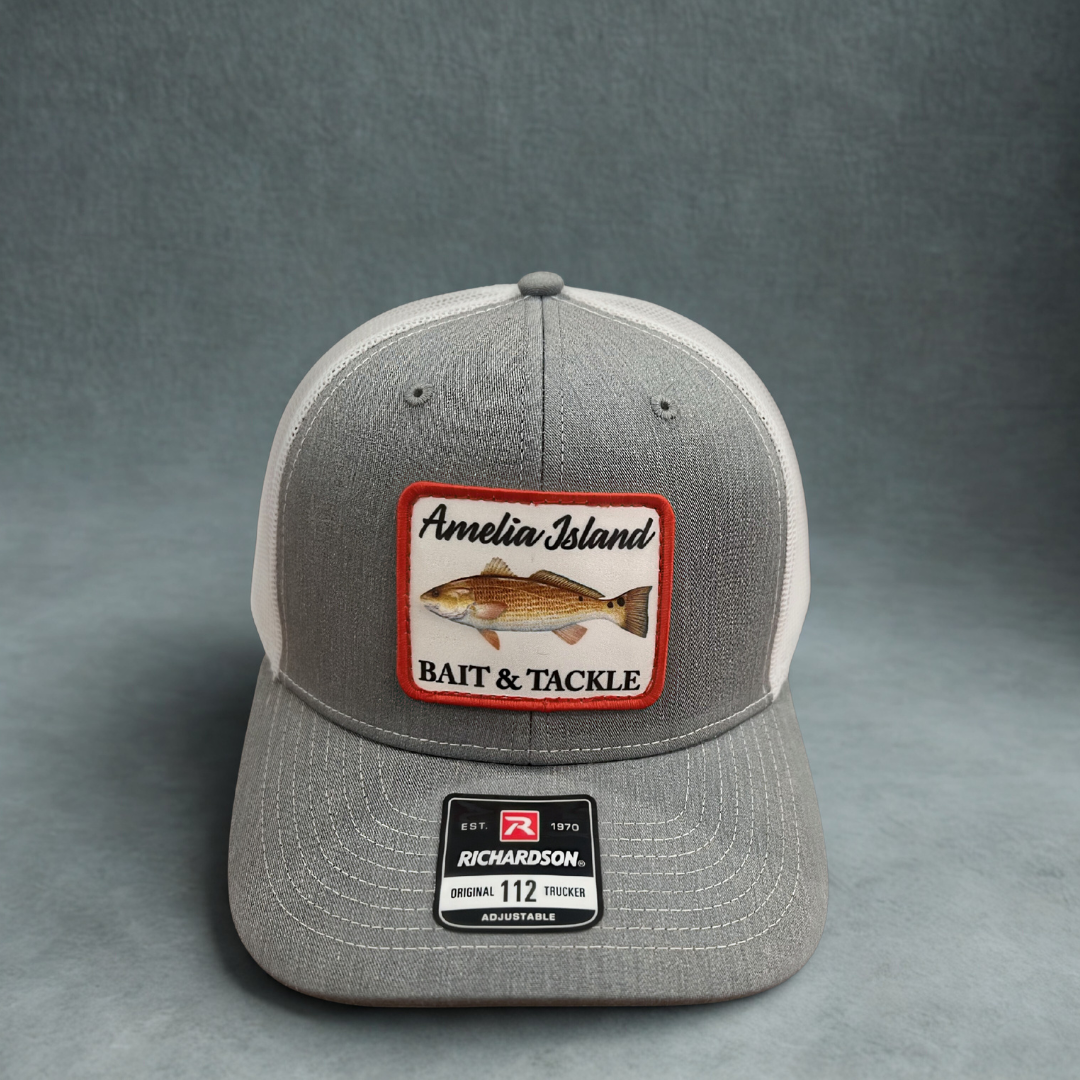 AIBT Redfish patch trucker hat Richardson 112 in REDFISH: Heather grey/white – studio view