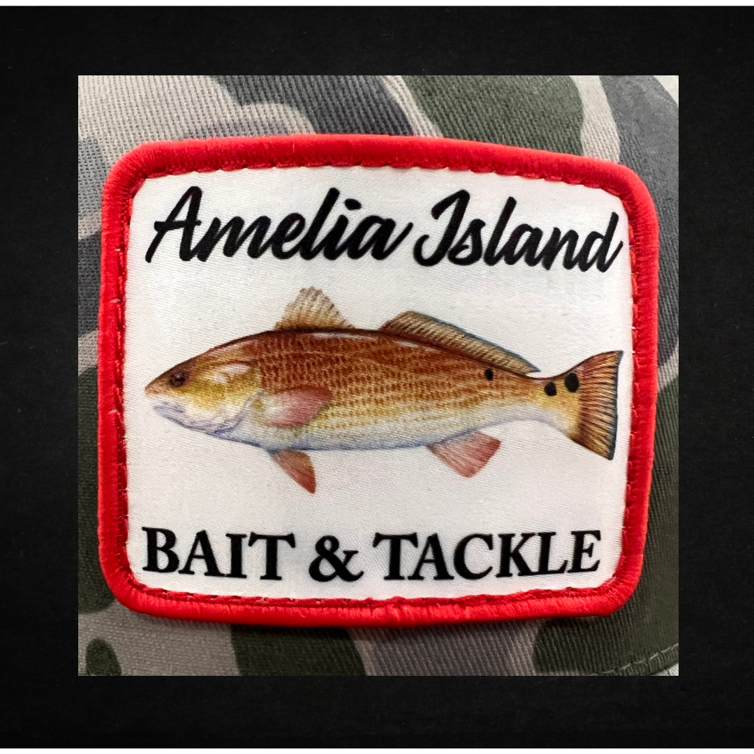 AIBT Redfish patch trucker hat Richardson 112 in duck camo marsh – CU view