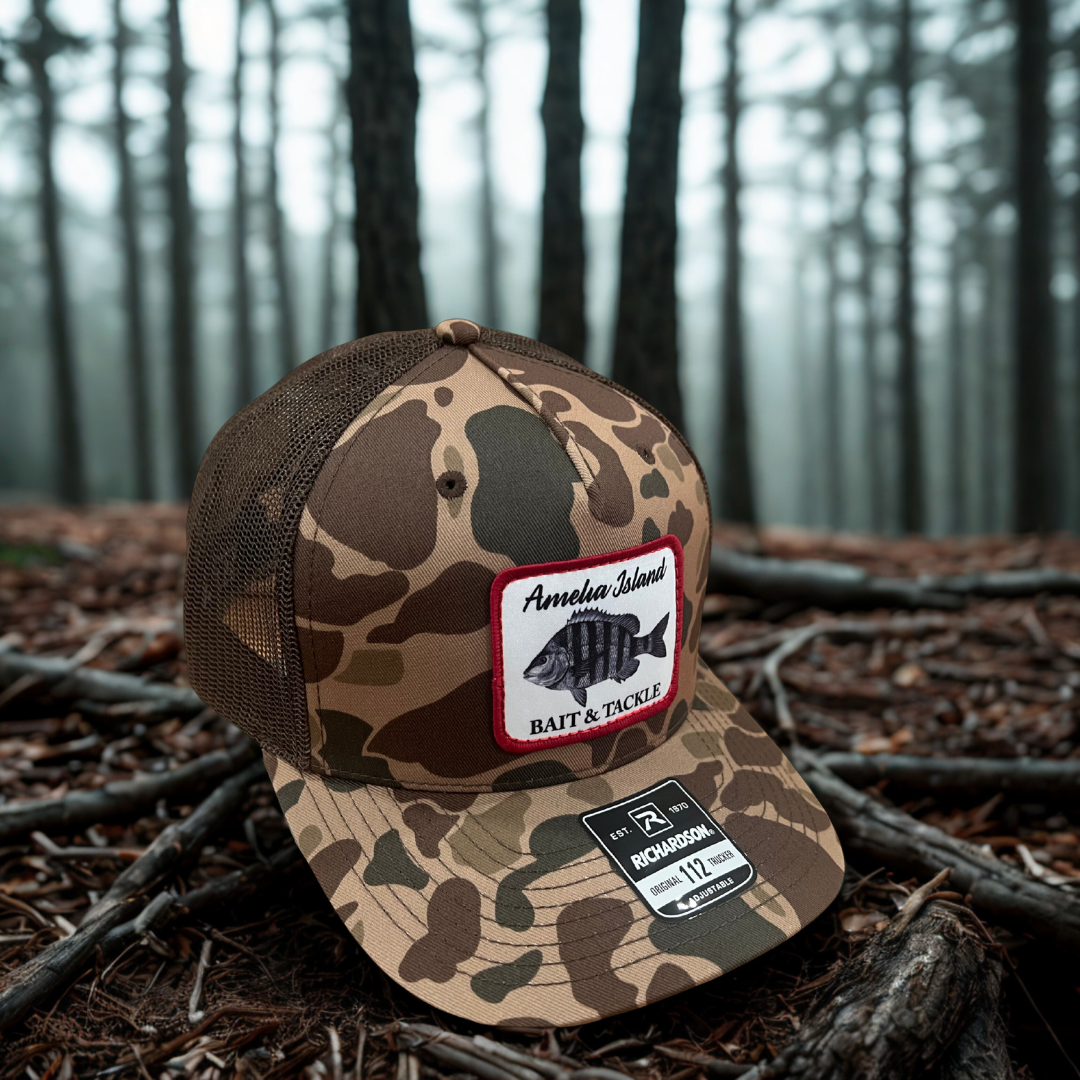 AIBT sheepshead patch trucker hat Richardson 112 in duck camo bark - hero view