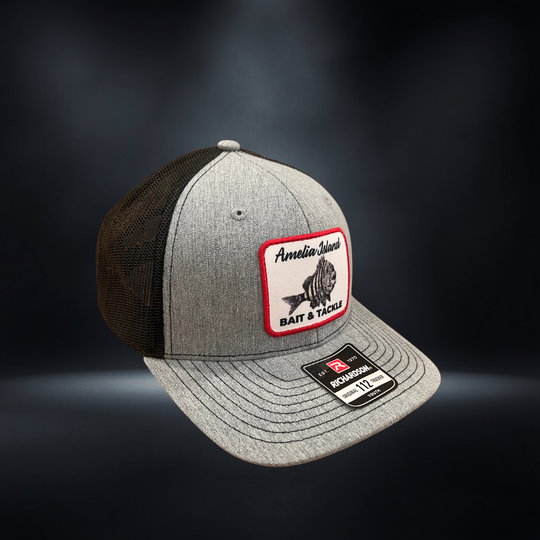 AIBT youth trucker hat Richardson 112 in Sheepshead: heather grey/black – studio view